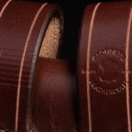 a close up of a pair of Handmade Leather Sheaths for the Buck 105.