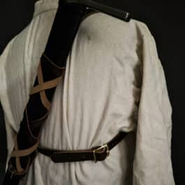 a Monster Hunter Sword Carrier with a brown belt on it.