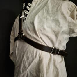 a Monster Hunter Sword Carrier with a brown belt on it.