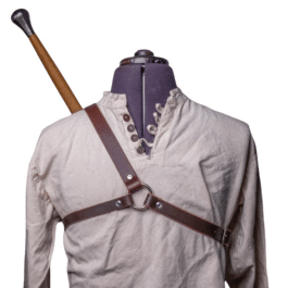 a mannequin with Bison Leather Sleeve Garters on top of it.