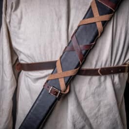 a man wearing Bison Leather Sleeve Garters.