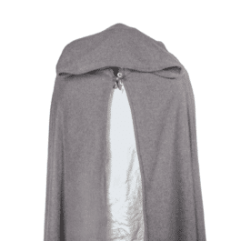 A woman wearing a Fleece Hooded Cloak with a white shirt underneath it.