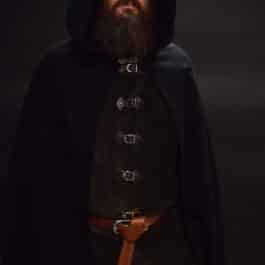 a man with beard wearing a black wool tweed hooded cloak - renaissance clothing - renaissance clothing men - renaissance clothing women - renaissance clothing near me - renaissance art clothing - renaissance era clothing - renaissance costume ideas