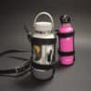 a pink and black Water Bottle Holster next to a pink and white Water Bottle Holster.