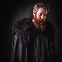 a man with a beard wearing a Northerner Cloak - renaissance clothing - renaissance clothing men - renaissance clothing women - renaissance clothing near me - renaissance art clothing - renaissance era clothing - renaissance costume ideas