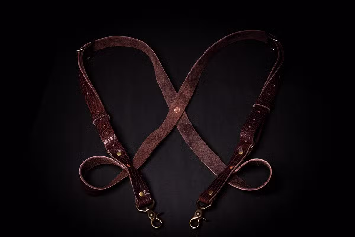 Bison Side Clip Suspenders laid on a table - renaissance clothing - renaissance clothing men - renaissance clothing women - renaissance clothing near me - renaissance art clothing - renaissance era clothing - renaissance costume ideas