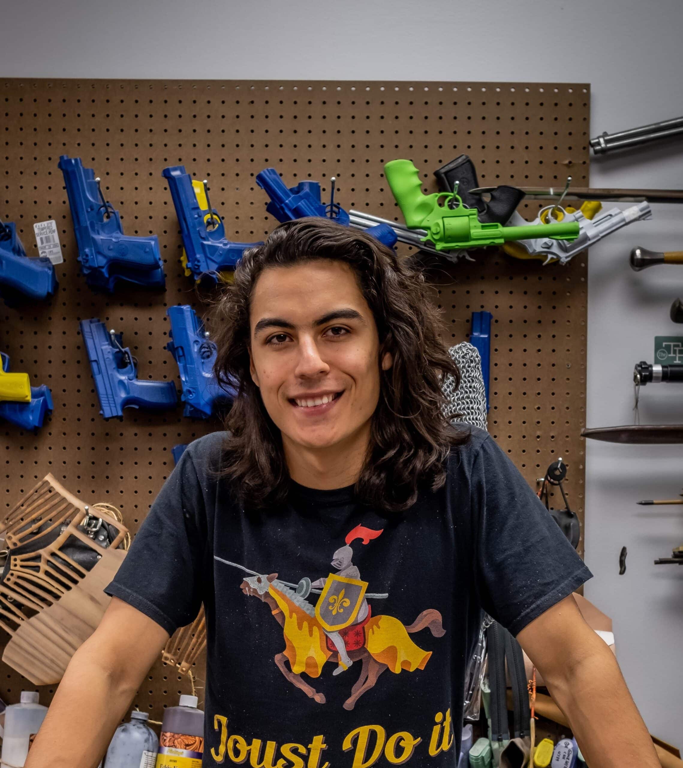 a man standing in front of a display of toys.