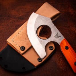 a Kydex sheath for the Benchmade Anonimus on top of it.