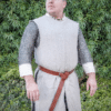 a man wearing a Linen Knights Surcoat - renaissance clothing - renaissance clothing men - renaissance clothing women - renaissance clothing near me - renaissance art clothing - renaissance era clothing - renaissance costume ideas