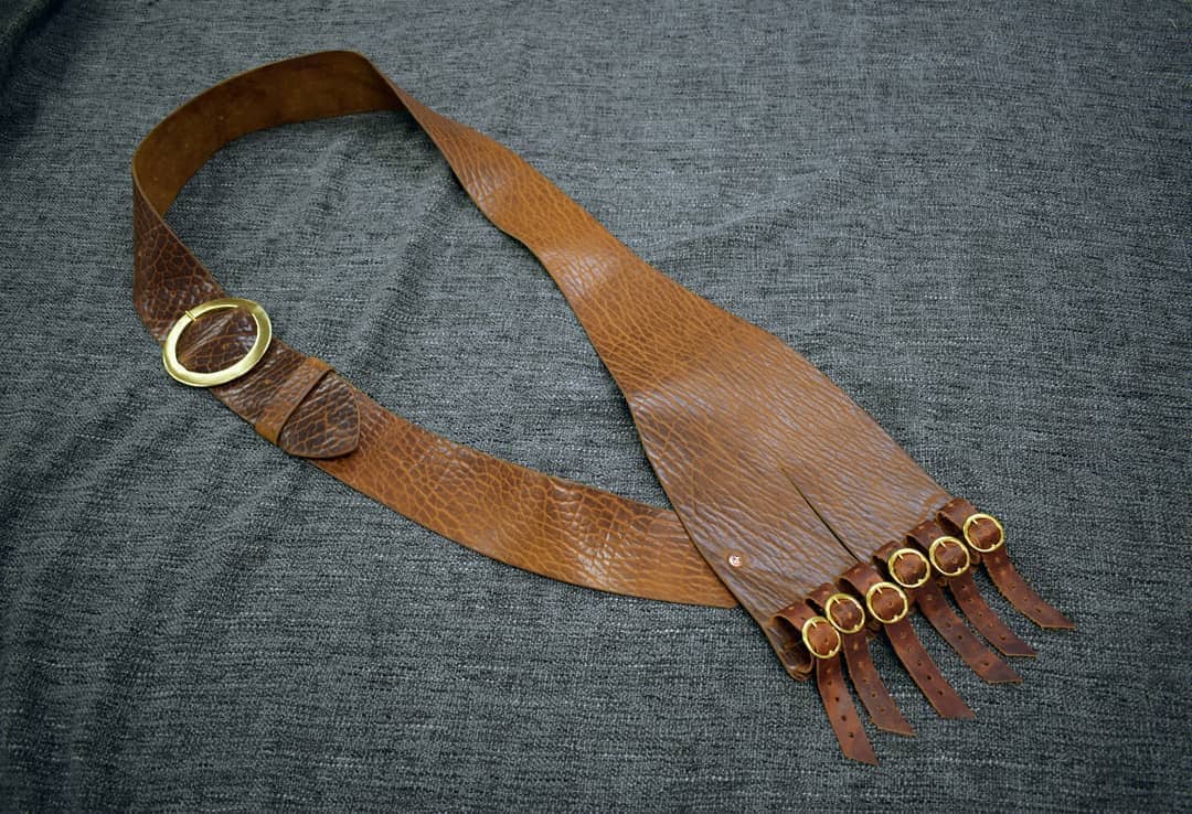 This single strap baldric is worn just like a belt. 
