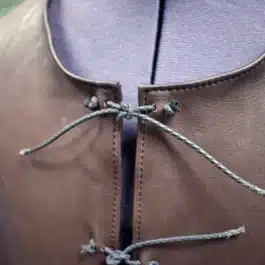 close up of a brown Deerskin Ranger Jerkin on a mannequin - renaissance clothing - renaissance clothing men - renaissance clothing women - renaissance clothing near me - renaissance art clothing - renaissance era clothing - renaissance costume ideas