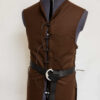 A Wool Strider Jerkin with a black belt on a mannequin.