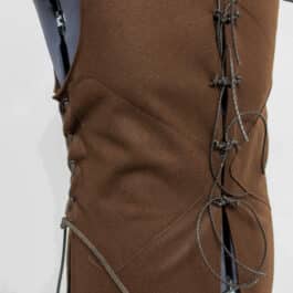 A Wool Strider Jerkin is worn by the mannequin.