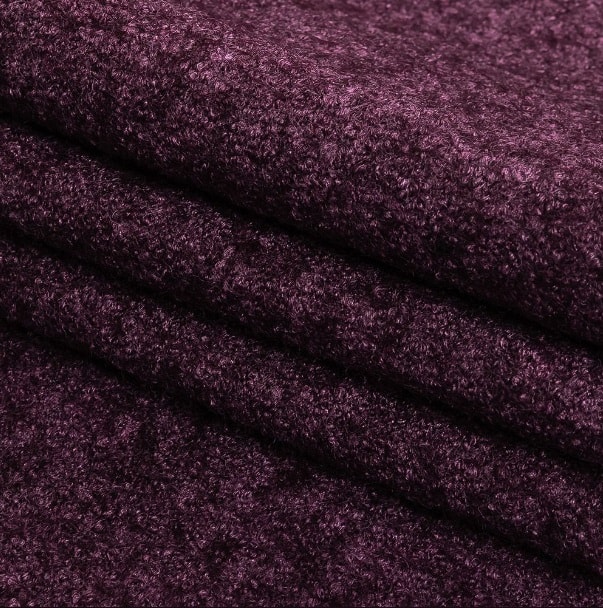 a close up of a purple fabric.