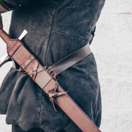 A man holding a sword with a Wood Core Scabbard for the Albion Royal Armories I:33.