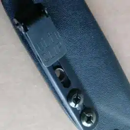 an ulticlip brand clip attached to a kydex sheath