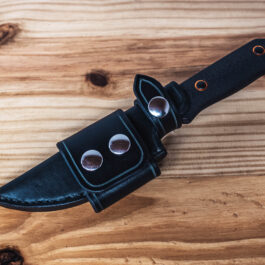 A leather sheath for the benchmade raghorn with a horizontal loop