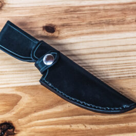 A leather sheath for the benchmade raghorn with a vertical loop