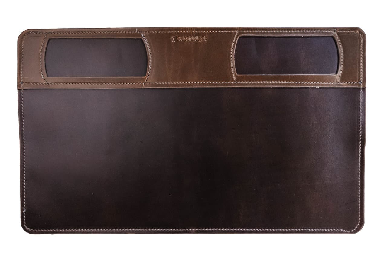 a brown leather mat on a white background