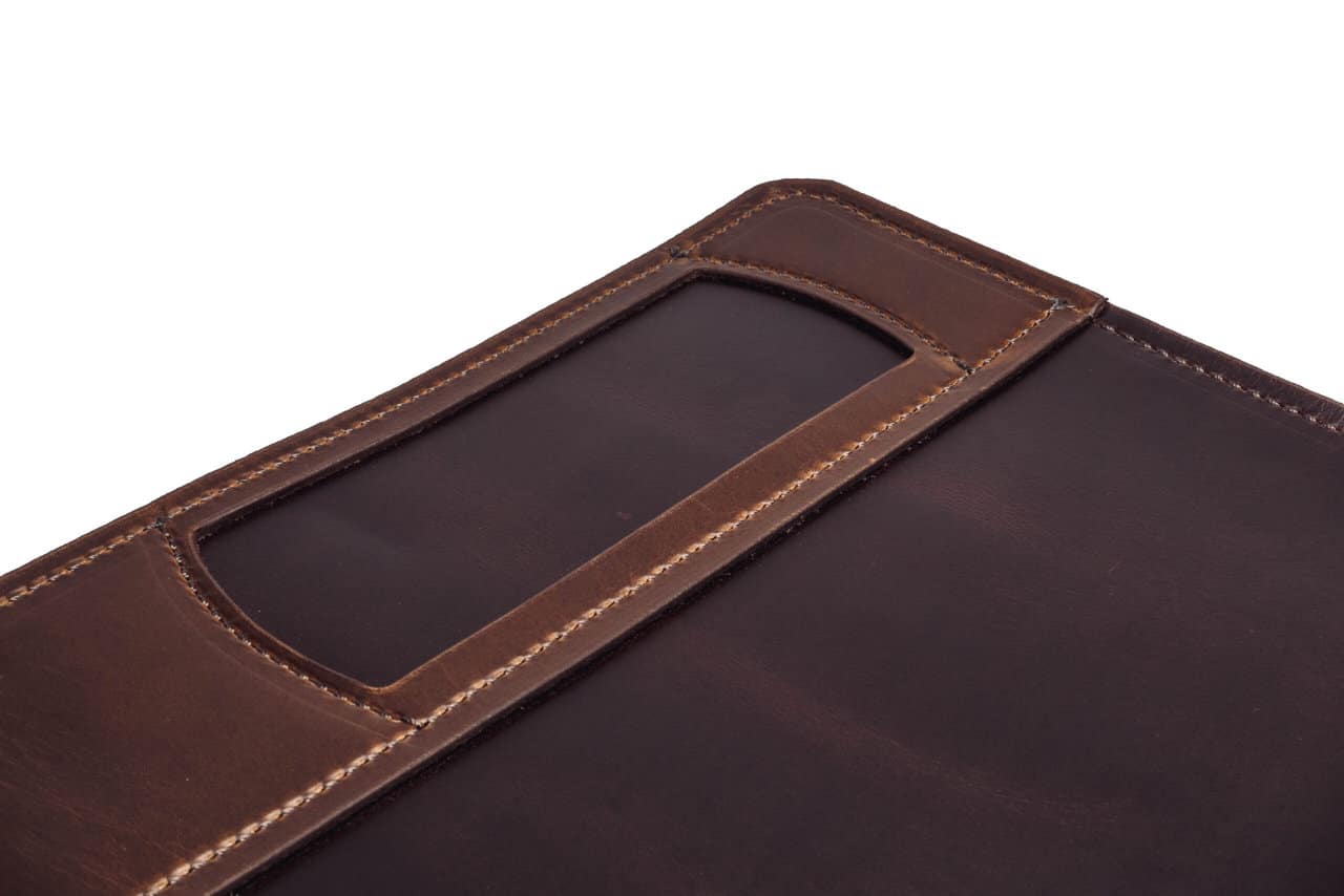 a brown leather mat on a white background