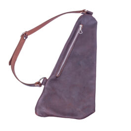 a light brown leather bag on a white background