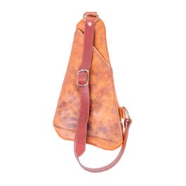 a light brown leather bag on a white background