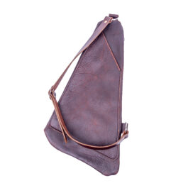 a light brown leather bag on a white background