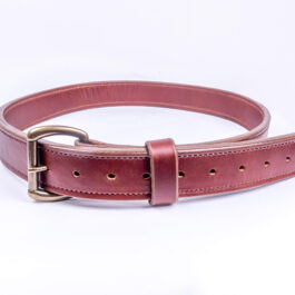 A brown Leather belt on a white background