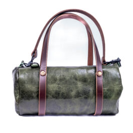 a green bison mini duffel with dark brown handles