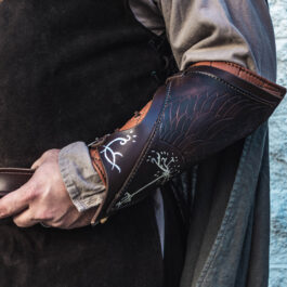 a man wearing Strider Vambraces.