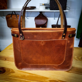 a light brown leather tote