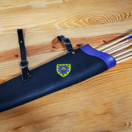 a cuswtomized hip quiver with period buckles and custom painted heraldry