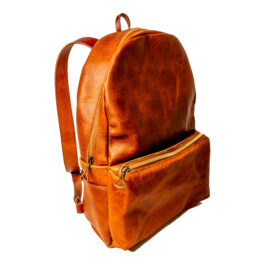 a light brown backpack on a white background
